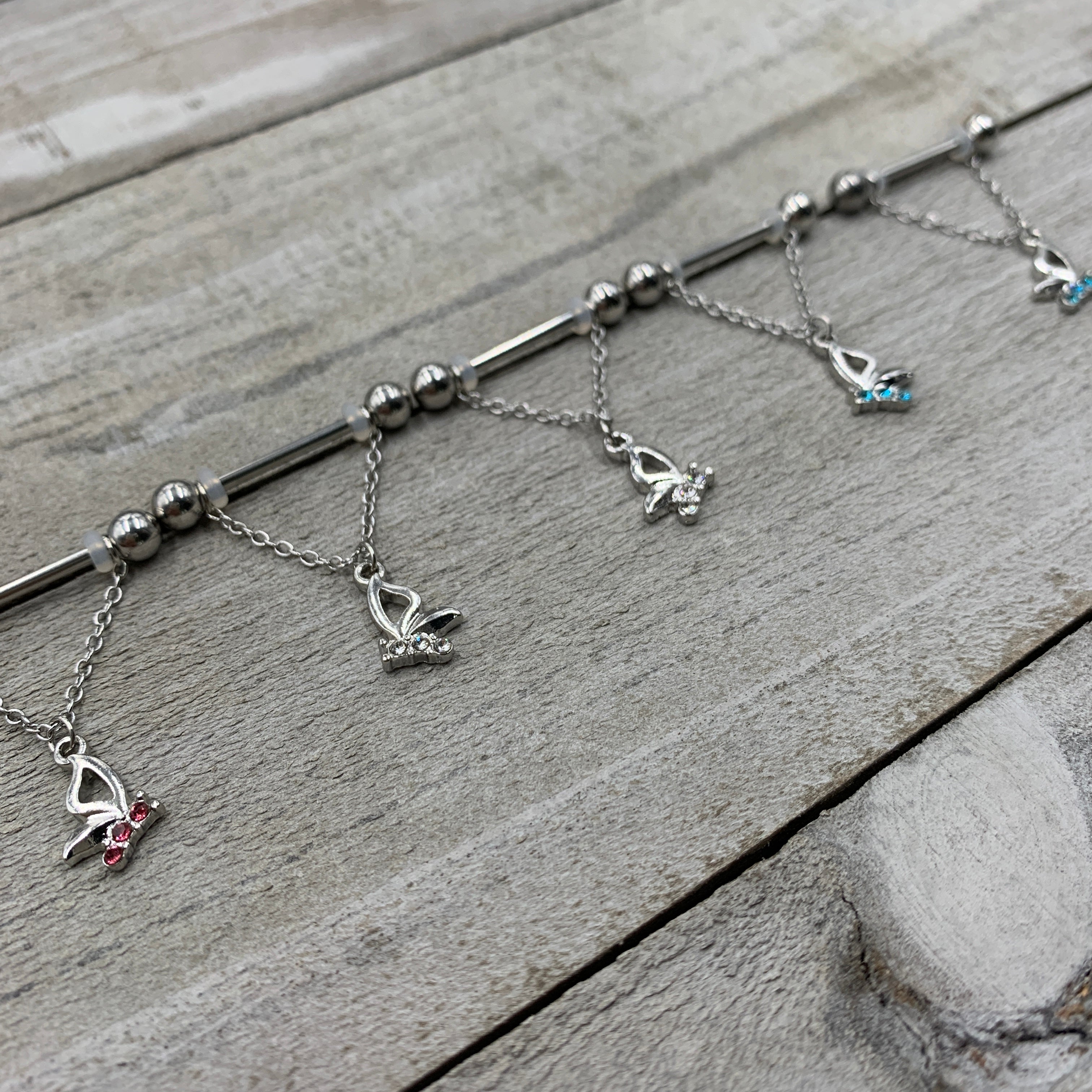 14G 5/8 Aqua Gem Hollow Butterfly Chain Dangle Nipple Ring Set