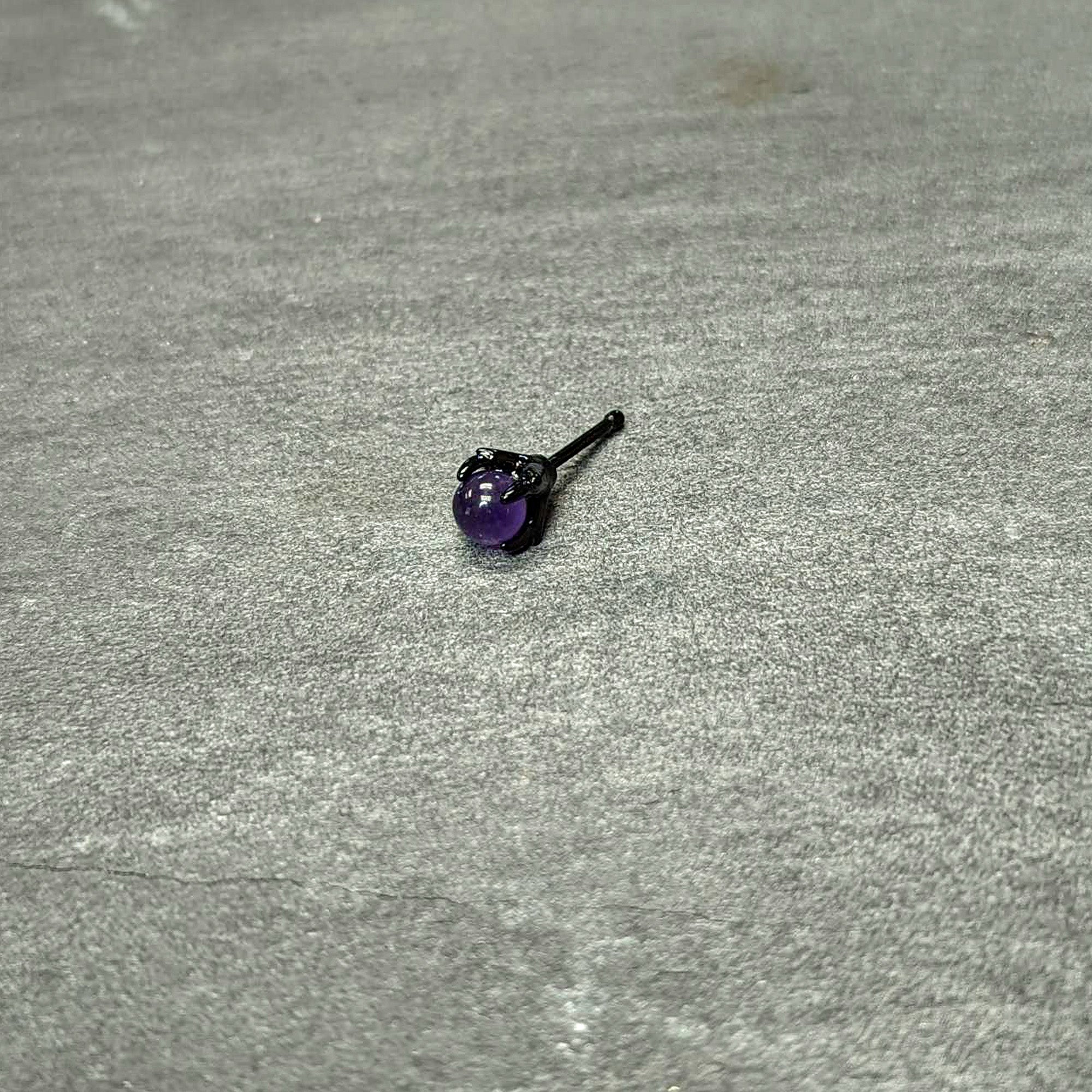20G 1/4 Purple Synthetic Amethyst Black Claw Hand Nose Bone